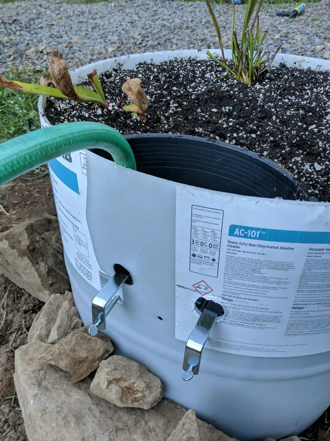 Exterior view of Little Giant trough float valve mounting in a Sarracenia bog installation